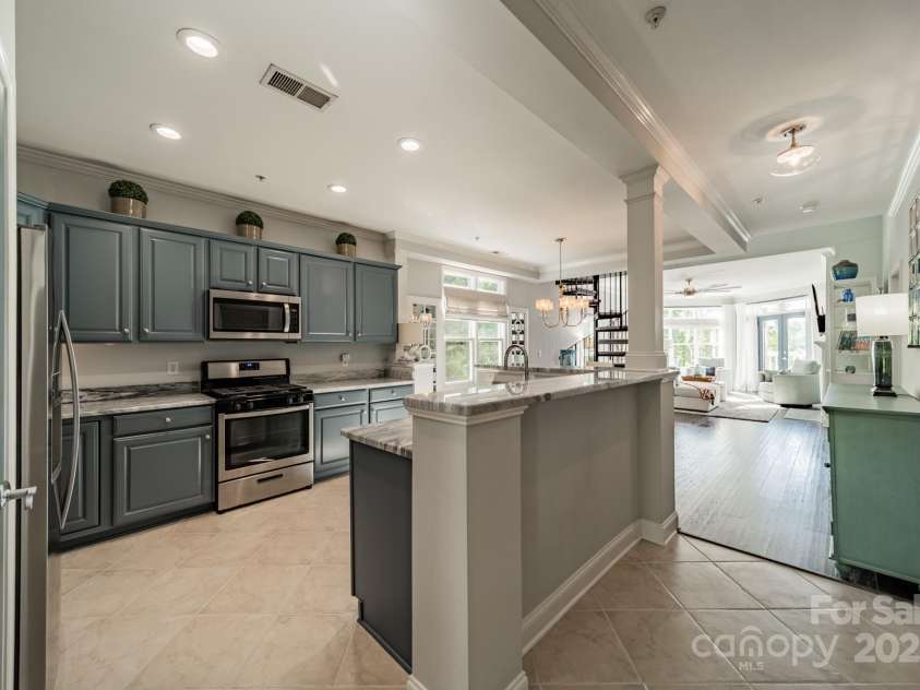 637 Williamson Road, Mooresville, NC 28117.  MLS# CAR4247530, YatesRealty ID 4736. A different view of the kitchen and open floor plan