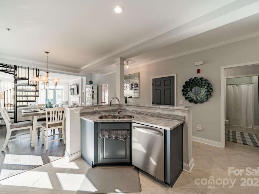 637 Williamson Road, Mooresville, NC 28117.  MLS# CAR4247530, YatesRealty ID 4736. Kitchen prep area and sink with views of the lake