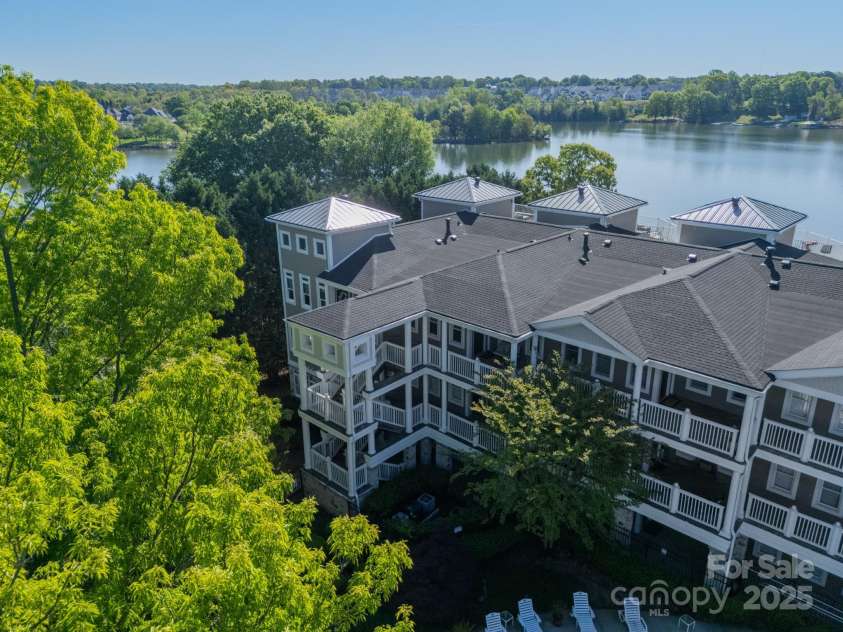 637 Williamson Road, Mooresville, NC 28117.  MLS# CAR4247530, YatesRealty ID 4736. Unit 309 is the upper floor, far left unit.  One of the two stairwells is nearby
