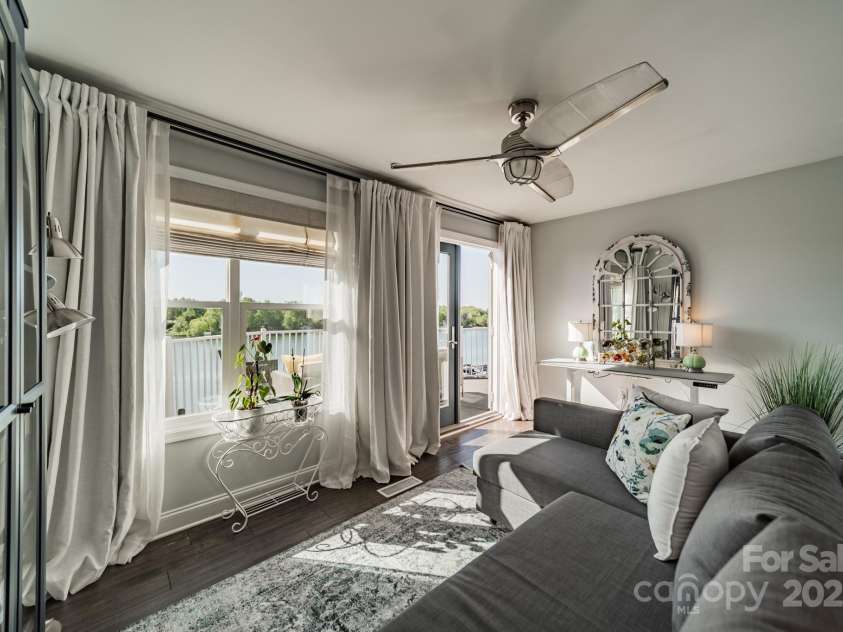 637 Williamson Road, Mooresville, NC 28117.  MLS# CAR4247530, YatesRealty ID 4736. Upstairs loft area with designer window treatments and curtains that stay with the home.