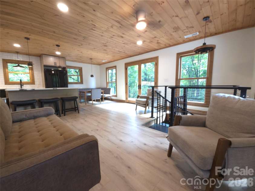 272 Bluebird Road, Lake Lure, NC 28746.  MLS# CAR4418403, YatesRealty ID 47361. Main level from front door