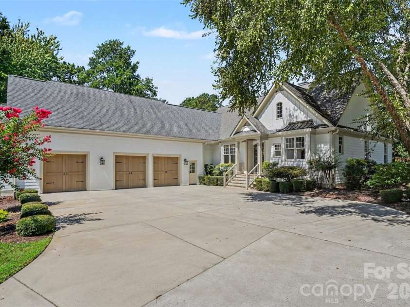 21253 Sandy Cove Road, Cornelius, NC 28031.  MLS# CAR4417192, YatesRealty ID 47365. Three car garage