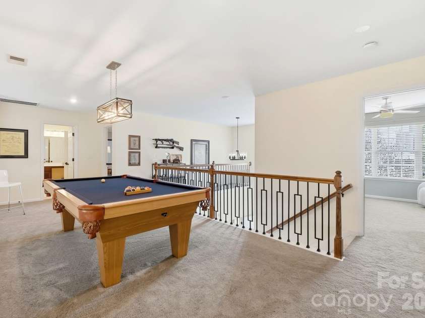 10933 Stone Trail Road, Charlotte, NC 28213.  MLS# CAR4417912, YatesRealty ID 47367. Additional space along that far wall would make an amazing library against the wall!