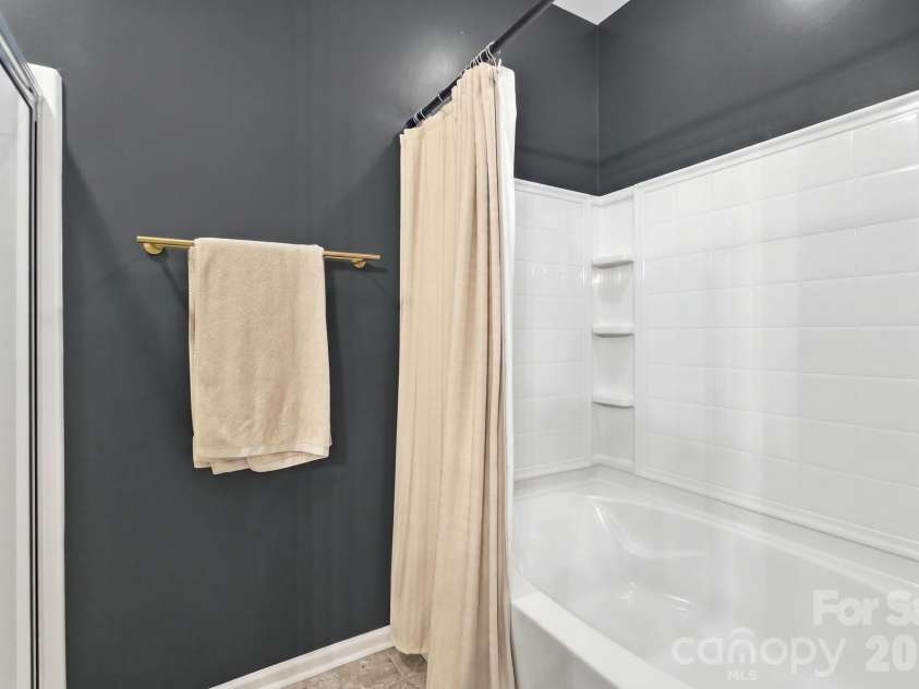 10933 Stone Trail Road, Charlotte, NC 28213.  MLS# CAR4417912, YatesRealty ID 47367. Primary bath has a separate shower and tub!