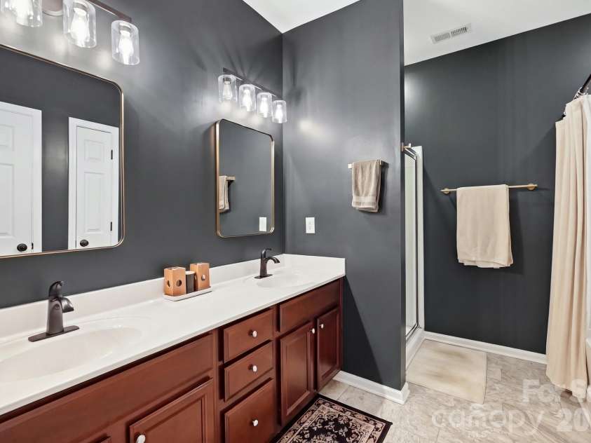 10933 Stone Trail Road, Charlotte, NC 28213.  MLS# CAR4417912, YatesRealty ID 47367. Primary bathroom!