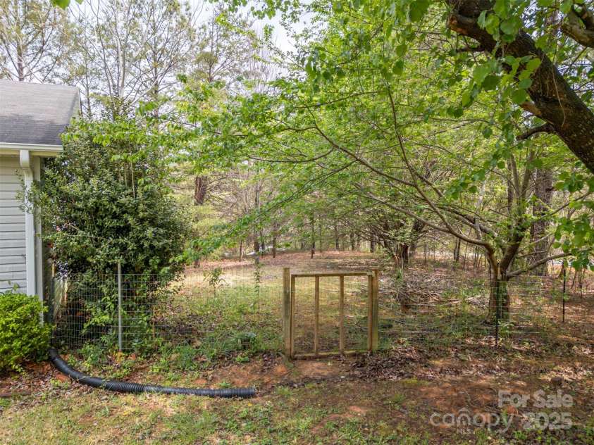 383 Woody Circle, Tryon, NC 28782.  MLS# CAR4242409, YatesRealty ID 4737. 