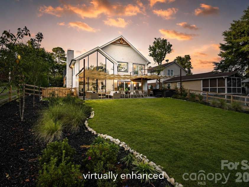 7834 Green Cove Court, Denver, NC 28037.  MLS# CAR4418778, YatesRealty ID 47377. Custom floor to ceiling windows off great room. Grass virtually enhanced.