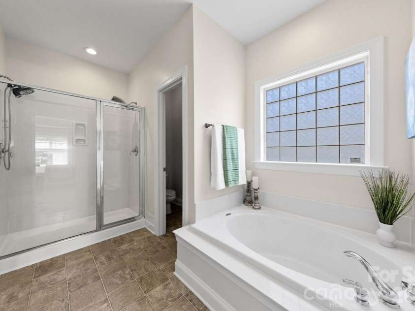 4002 Ladys Secret Drive, Indian Trail, NC 28079.  MLS# CAR4418336, YatesRealty ID 47391. Primary Bathroom