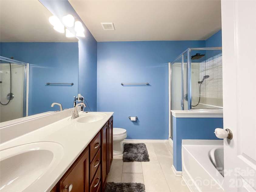 1033 Mountain Laurel Court, Matthews, NC 28104.  MLS# CAR4417453, YatesRealty ID 47395. Primary Bathroom
