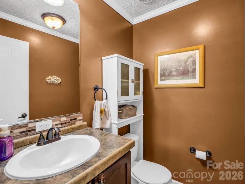 310 Brooks Road Extension, Bostic, NC 28018.  MLS# CAR4417492, YatesRealty ID 47403. Half bath