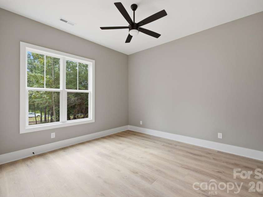 5089 Hidden Forest Drive, Denver, NC 28037.  MLS# CAR4416808, YatesRealty ID 47406. Guest Suite One