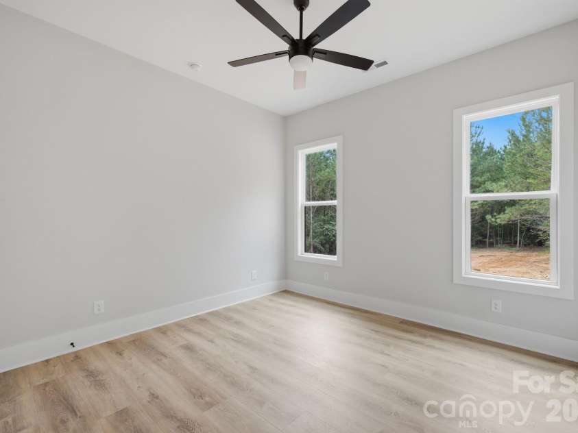 5089 Hidden Forest Drive, Denver, NC 28037.  MLS# CAR4416808, YatesRealty ID 47406. Guest Suite Three