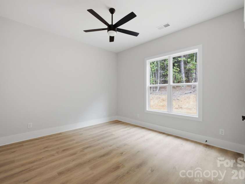 5089 Hidden Forest Drive, Denver, NC 28037.  MLS# CAR4416808, YatesRealty ID 47406. Guest Suite Two