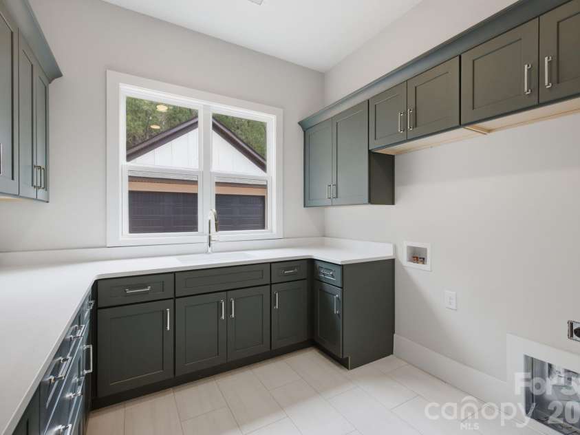 5089 Hidden Forest Drive, Denver, NC 28037.  MLS# CAR4416808, YatesRealty ID 47406. Laundry Room