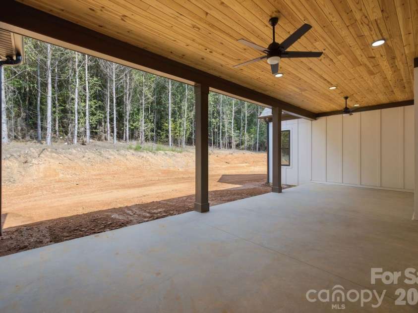 5089 Hidden Forest Drive, Denver, NC 28037.  MLS# CAR4416808, YatesRealty ID 47406. Rear Covered Porch