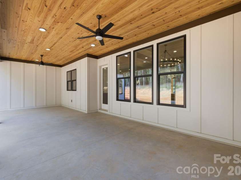 5089 Hidden Forest Drive, Denver, NC 28037.  MLS# CAR4416808, YatesRealty ID 47406. Rear Covered Porch