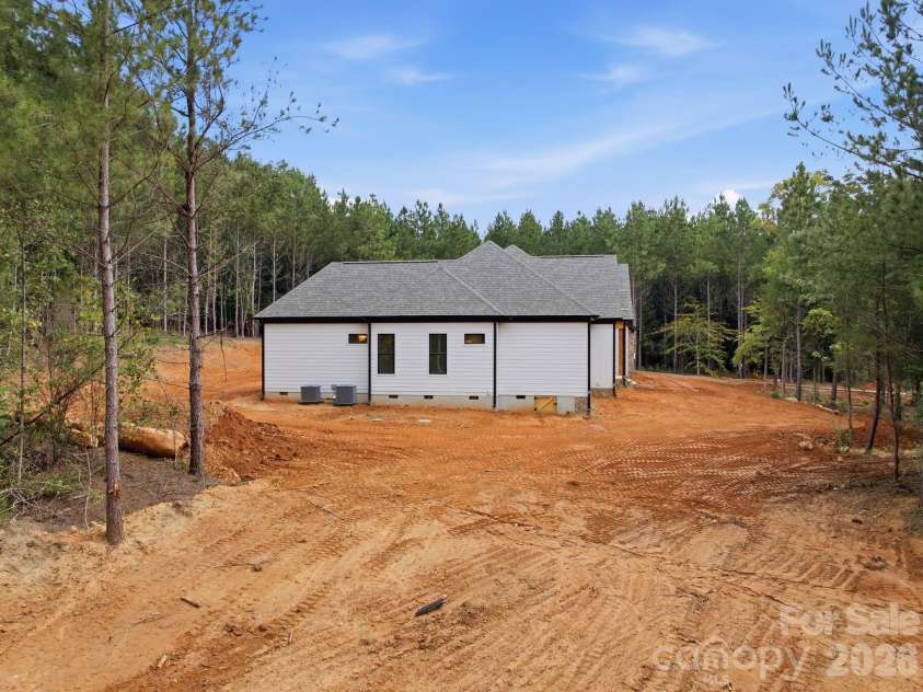 5809 Hidden Forest Drive, Denver, NC 28037.  MLS# CAR4416808, YatesRealty ID 47406. Side Elevation