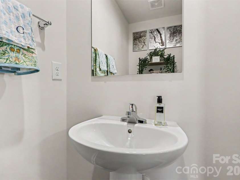 5116 Downhaul Drive, Charlotte, NC 28269.  MLS# CAR4417814, YatesRealty ID 47409. Main level half bath