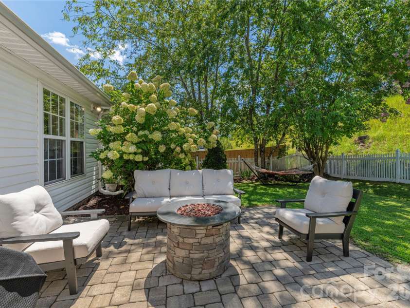 328 Planters Creek Road, Fletcher, NC 28732.  MLS# CAR4415867, YatesRealty ID 47429. Expanded Back Patio (2023)