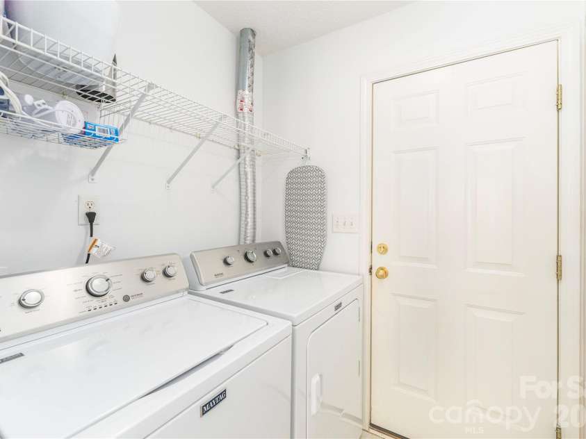 328 Planters Creek Road, Fletcher, NC 28732.  MLS# CAR4415867, YatesRealty ID 47429. Laundry Space-Off Two Car Garage