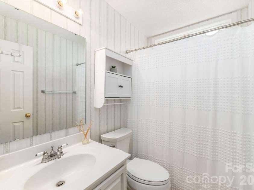 328 Planters Creek Road, Fletcher, NC 28732.  MLS# CAR4415867, YatesRealty ID 47429. Shared Guest Bathroom