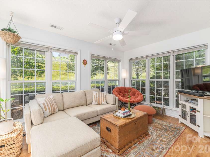 328 Planters Creek Road, Fletcher, NC 28732.  MLS# CAR4415867, YatesRealty ID 47429. Sunroom-Windows Galore