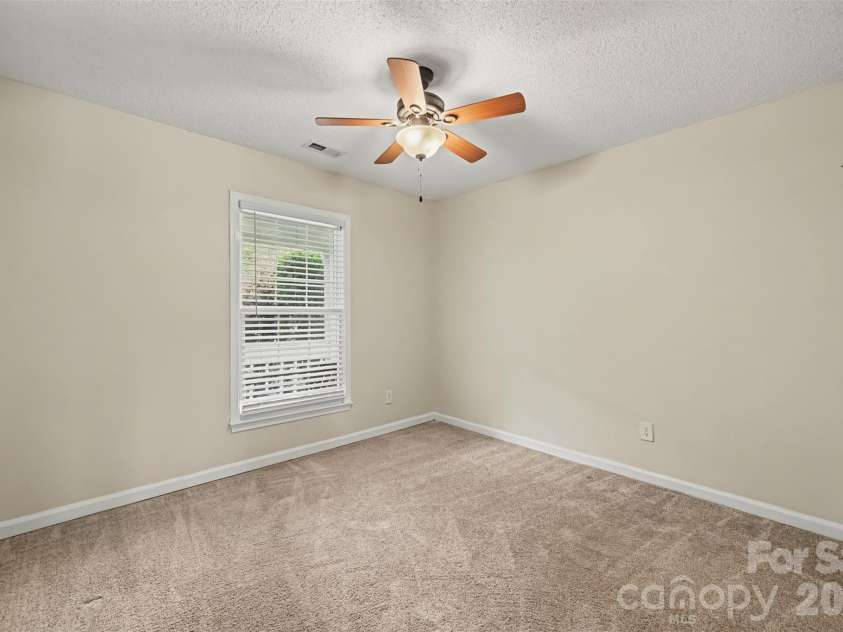 10117 Crayton Drive, Charlotte, NC 28269.  MLS# CAR4415978, YatesRealty ID 47431. Additional bedroom with natural light.