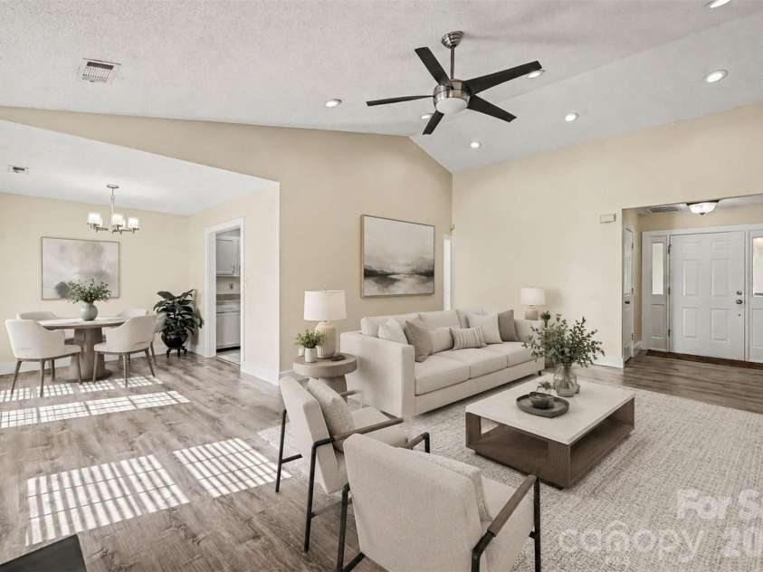 10117 Crayton Drive, Charlotte, NC 28269.  MLS# CAR4415978, YatesRealty ID 47431. Living room — virtually staged.
