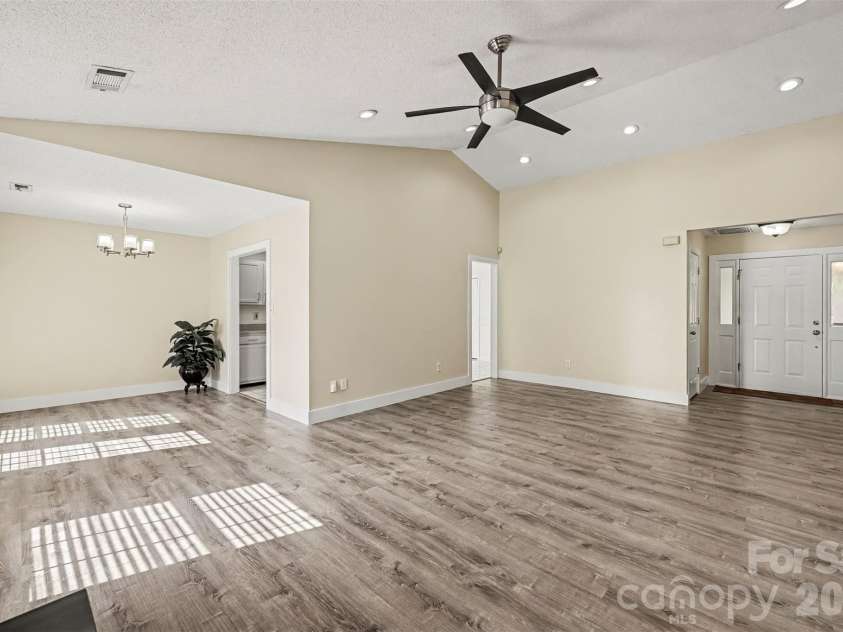 10117 Crayton Drive, Charlotte, NC 28269.  MLS# CAR4415978, YatesRealty ID 47431. Open-concept living and dining areas.