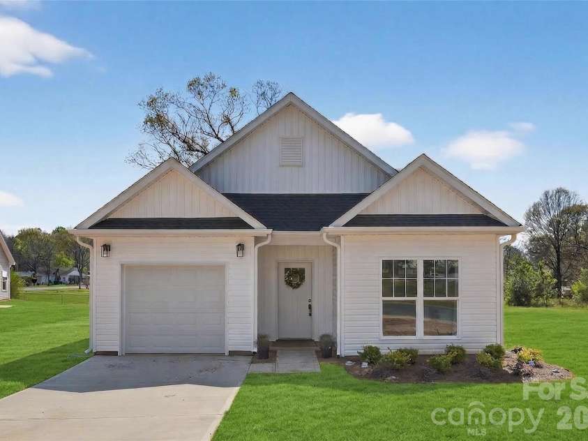 5408 Skycrest Drive, Charlotte, NC 28269.  MLS# CAR4414751, YatesRealty ID 47437. Photos are representative from prior build