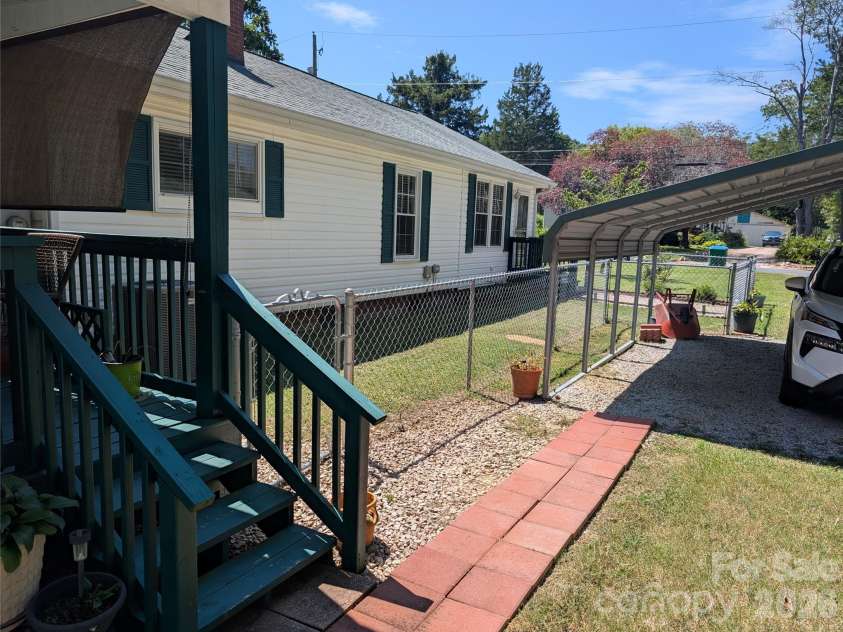 406 Kimmons Street, Landis, NC 28088.  MLS# CAR4416117, YatesRealty ID 47447. Exterior Side , Dbl Carport, and Covered Deck
