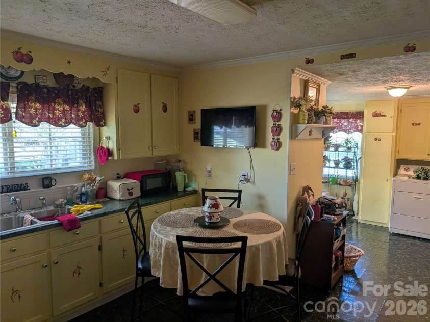406 Kimmons Street, Landis, NC 28088.  MLS# CAR4416117, YatesRealty ID 47447. Kitchen with Wall TV