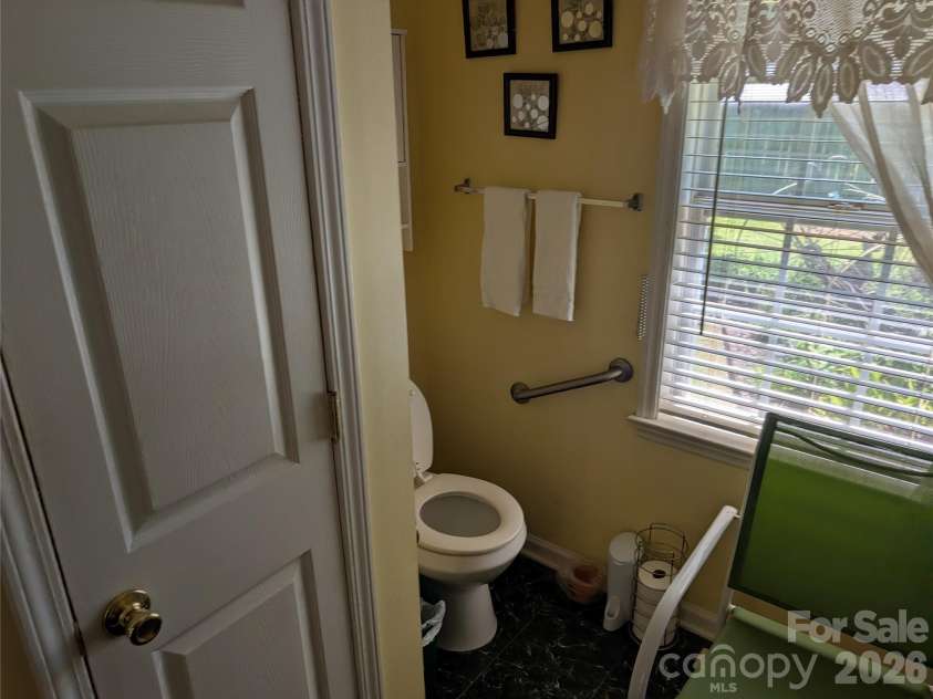 406 Kimmons Street, Landis, NC 28088.  MLS# CAR4416117, YatesRealty ID 47447. Water Closet in Bathroom