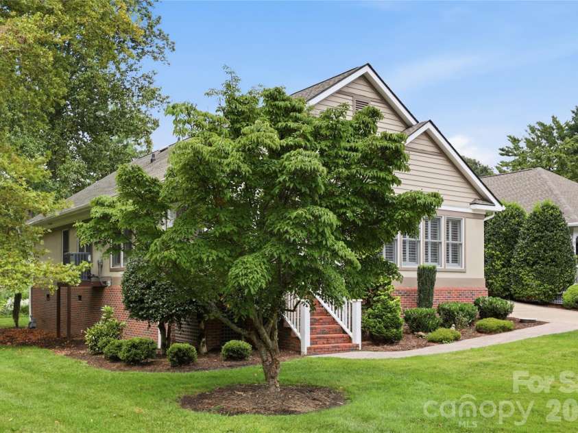 18 Creekside Way, Asheville, NC 28804.  MLS# CAR4411851, YatesRealty ID 47449. Beautiful setting with old growth trees