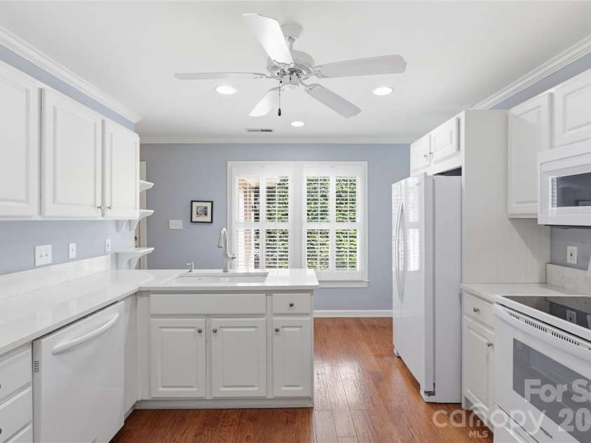 18 Creekside Way, Asheville, NC 28804.  MLS# CAR4411851, YatesRealty ID 47449. Crisp whit cabinets and quartz