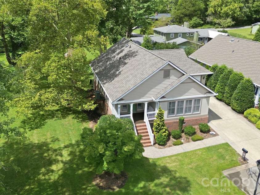 18 Creekside Way, Asheville, NC 28804.  MLS# CAR4411851, YatesRealty ID 47449. Spacious green space-maintenance free