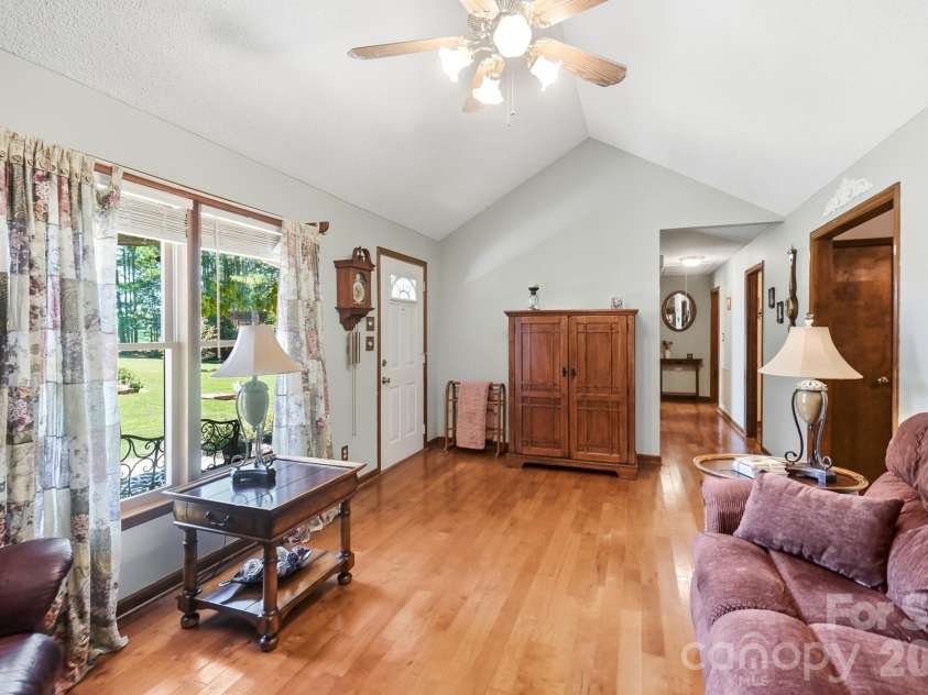3201 Gilboa Road, Wingate, NC 28174.  MLS# CAR4415181, YatesRealty ID 47454. Cathedral ceilings! Ceiling fans in most rooms