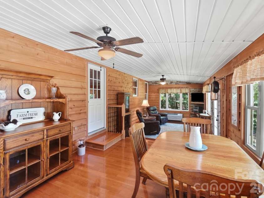 3201 Gilboa Road, Wingate, NC 28174.  MLS# CAR4415181, YatesRealty ID 47454. Dining area within the sunroom
