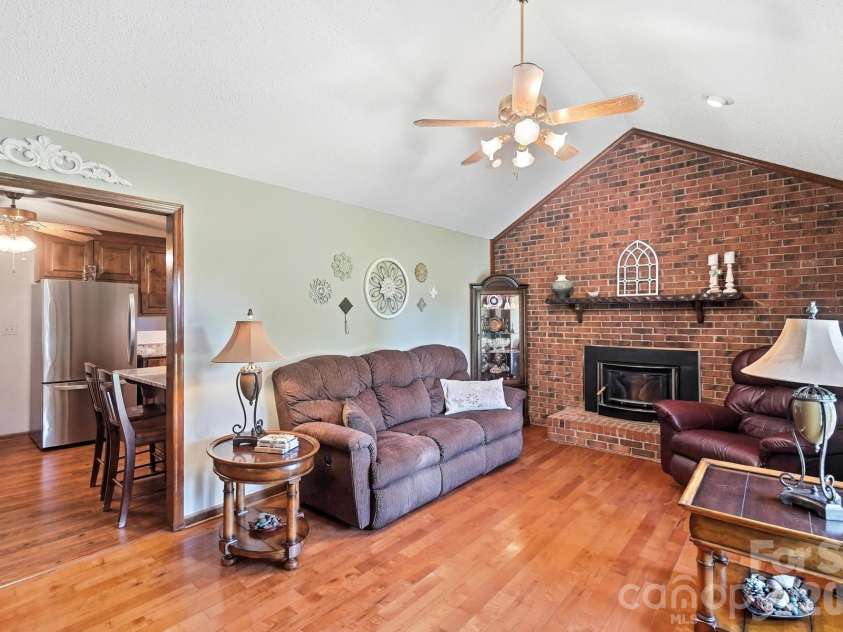 3201 Gilboa Road, Wingate, NC 28174.  MLS# CAR4415181, YatesRealty ID 47454. Hardwoods and LVP throughout the home.