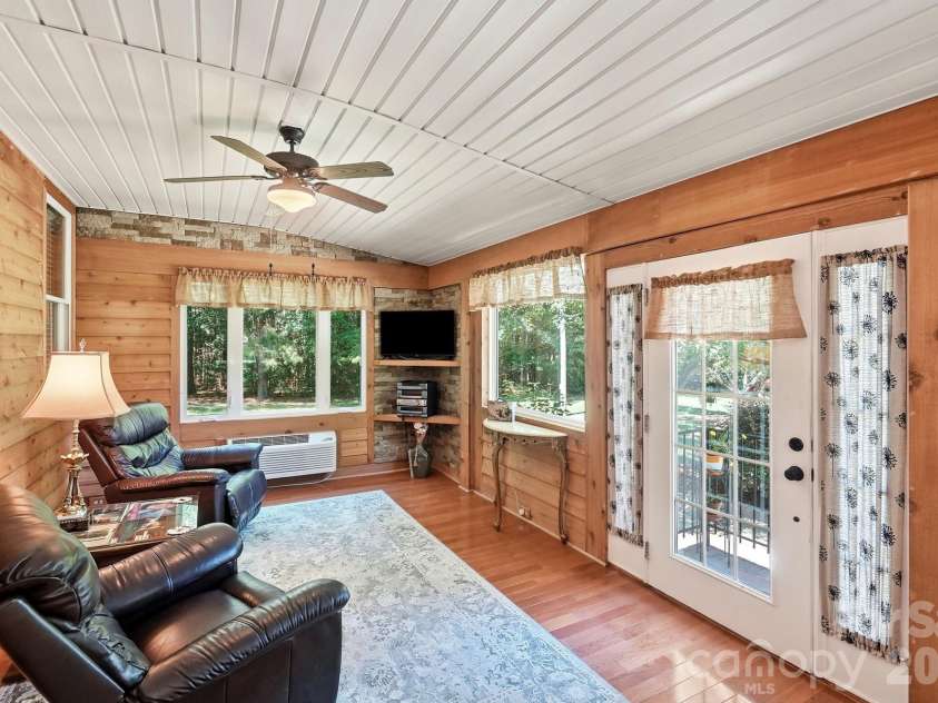 3201 Gilboa Road, Wingate, NC 28174.  MLS# CAR4415181, YatesRealty ID 47454. Sunroom overlooks the back - your private oasis