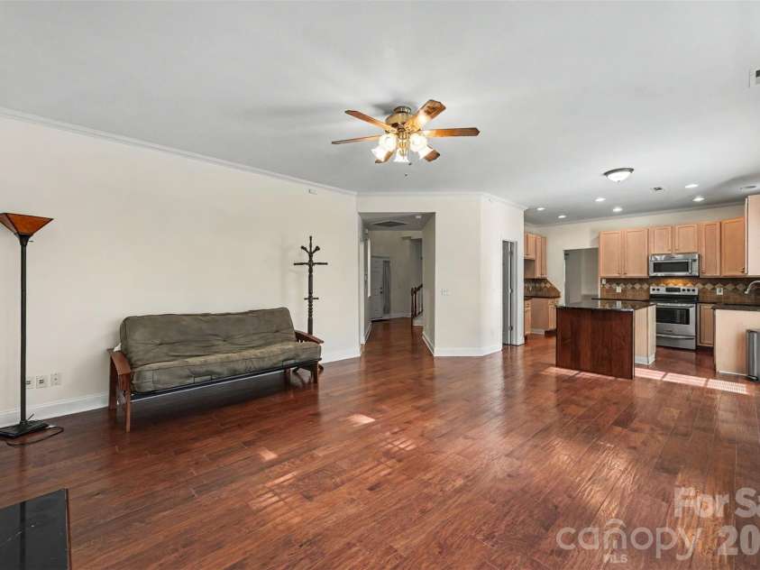 5839 BROOKSTONE Drive, Concord, NC 28027.  MLS# CAR4397657, YatesRealty ID 47457. Family Room & Kitchen view