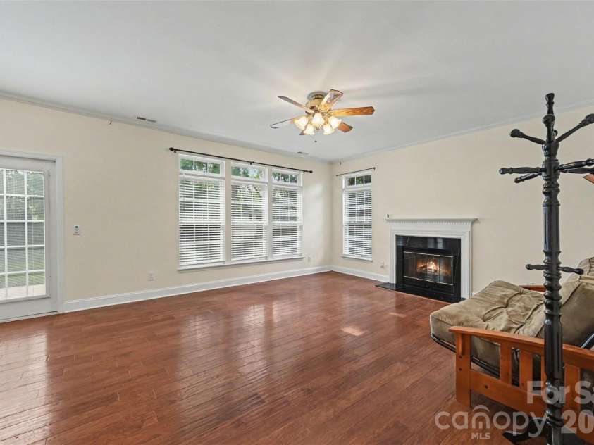 5839 BROOKSTONE Drive, Concord, NC 28027.  MLS# CAR4397657, YatesRealty ID 47457. Family Room with Fireplace