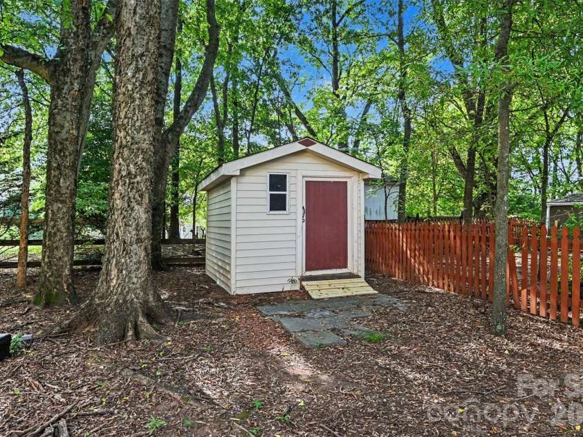 5839 BROOKSTONE Drive, Concord, NC 28027.  MLS# CAR4397657, YatesRealty ID 47457. Shed Conveys