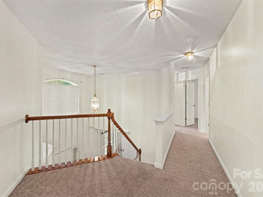 5839 BROOKSTONE Drive, Concord, NC 28027.  MLS# CAR4397657, YatesRealty ID 47457. Upstairs over looking the entryway