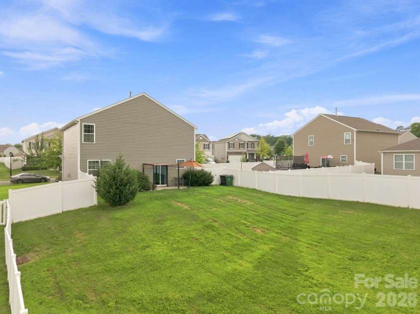 2424 Tallet Trace, Charlotte, NC 28216.  MLS# CAR4418651, YatesRealty ID 47471. Fully Fenced Backyard