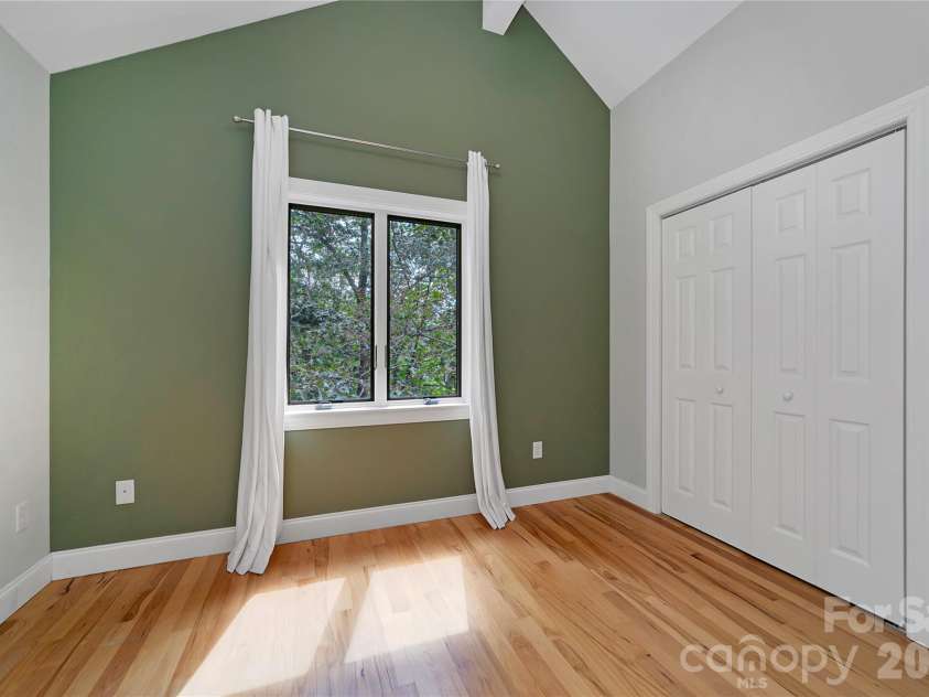 72 Memory Lane, Brevard, NC 28712.  MLS# CAR4352602, YatesRealty ID 47474. 2nd upper level bedroom