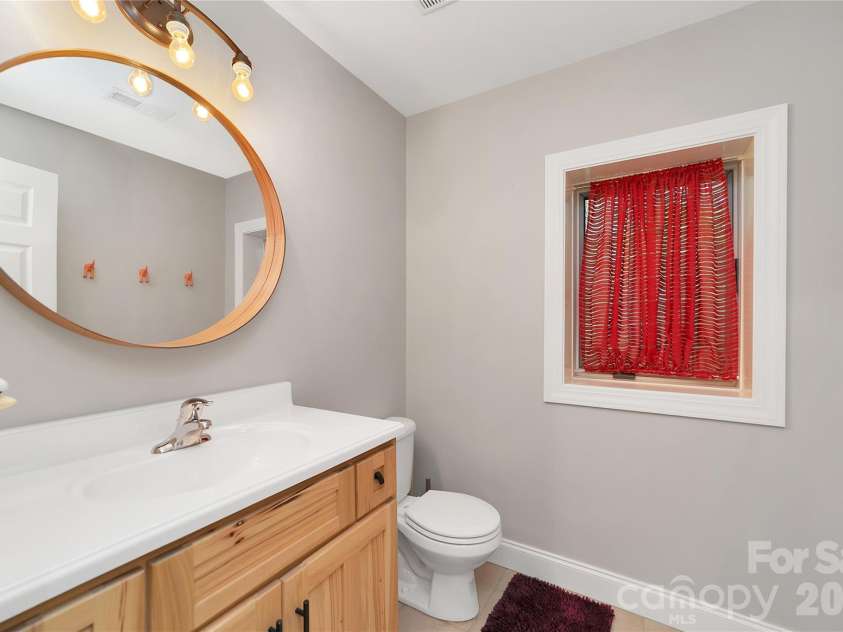 72 Memory Lane, Brevard, NC 28712.  MLS# CAR4352602, YatesRealty ID 47474. Basement 1/2 bath