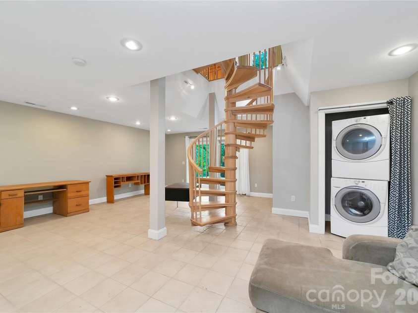 72 Memory Lane, Brevard, NC 28712.  MLS# CAR4352602, YatesRealty ID 47474. Basement