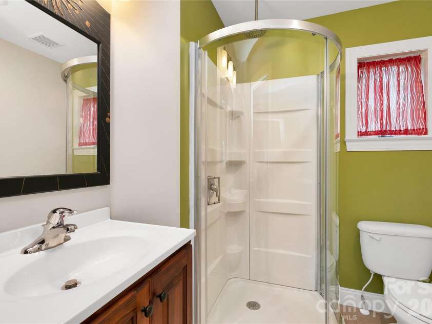 72 Memory Lane, Brevard, NC 28712.  MLS# CAR4352602, YatesRealty ID 47474. Main level bath