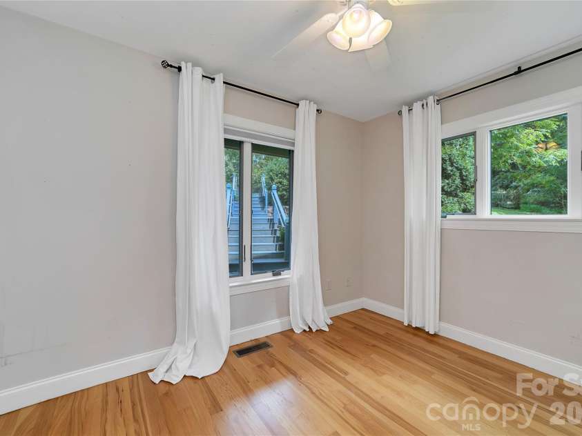 72 Memory Lane, Brevard, NC 28712.  MLS# CAR4352602, YatesRealty ID 47474. Main level bedroom